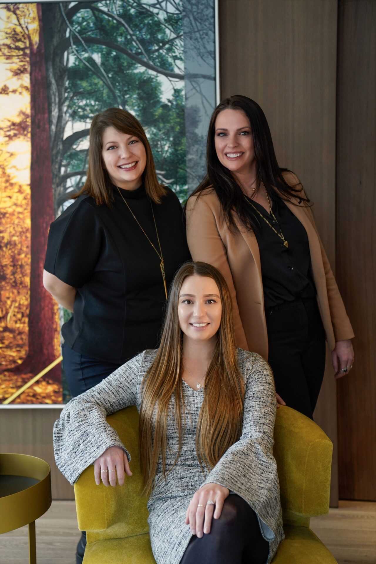 a photo of three women, the management team at aspen street lodge. brittany shami, jennifer frett and ashley tesmer